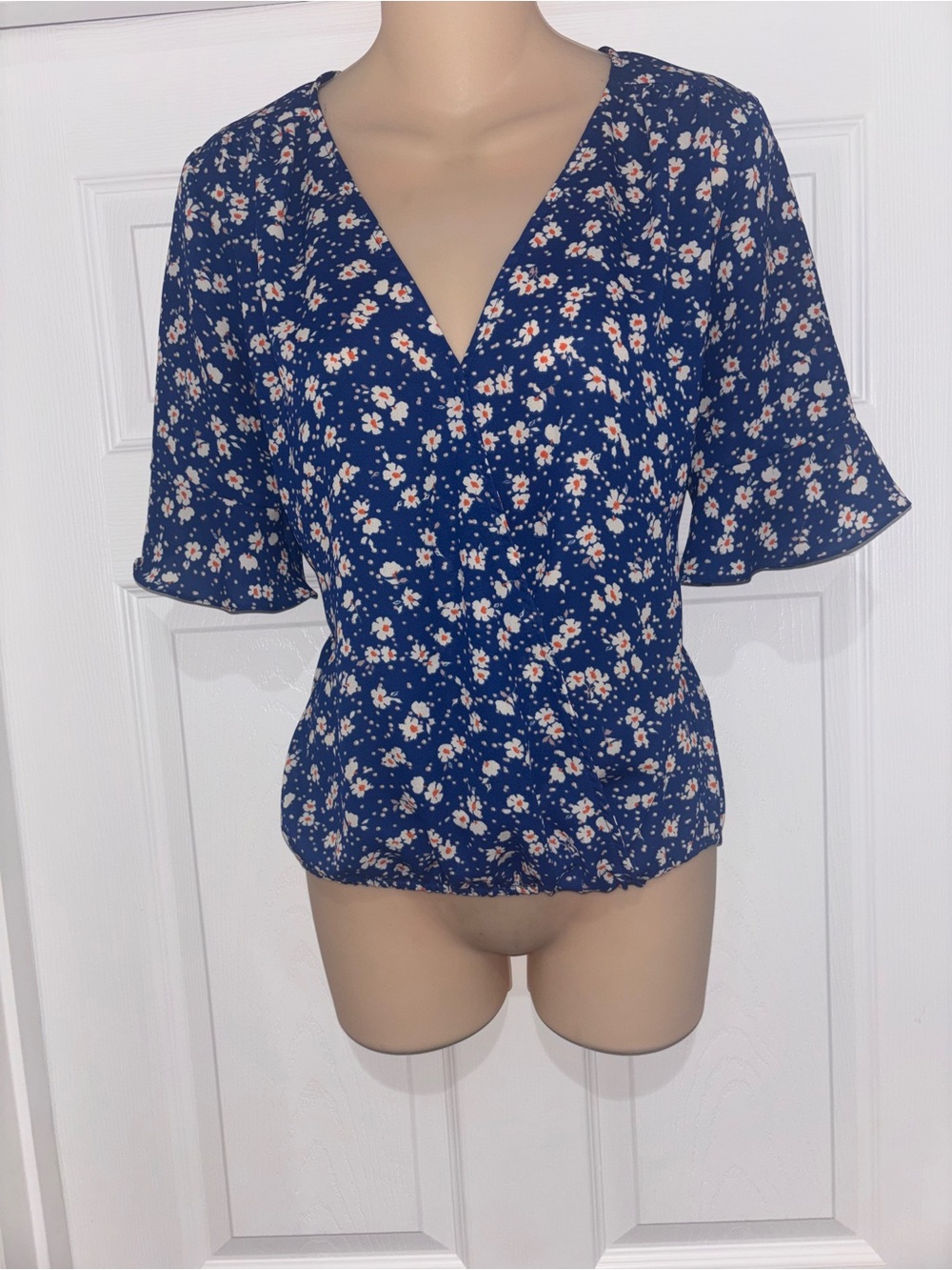Collective Concepts Navy Floral V-Neck Peplum Blouse
